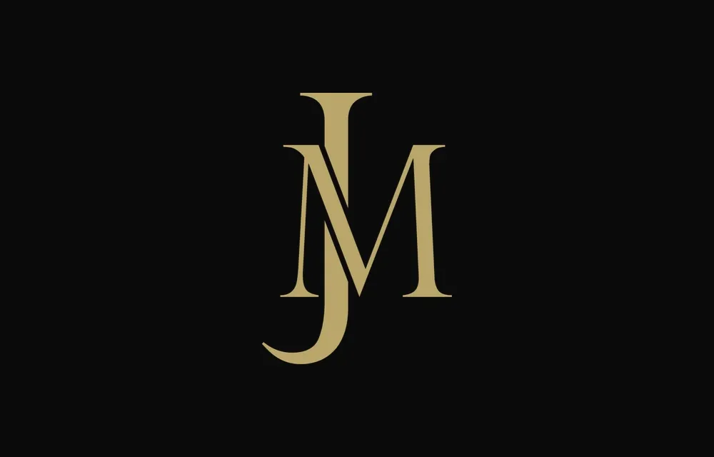 The monogram in gold on black.