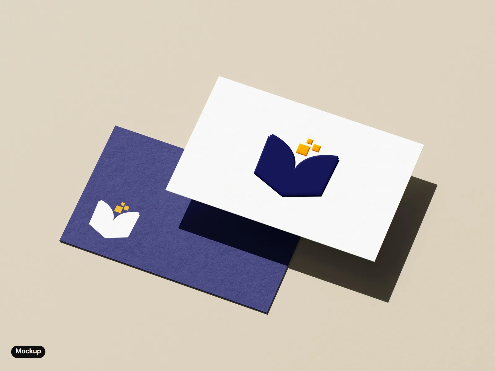 Mockup: two business cards on a beige ground: a white front with the indigo and amber mark printed and embossed, over an indigo back with the white and amber mark in its corner.